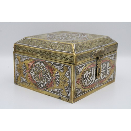 19 - An Islamic Egyptian Brass Box with Silver Inlay and Wooden Inside

Height: Approximately 8.2cm
Lengt... 