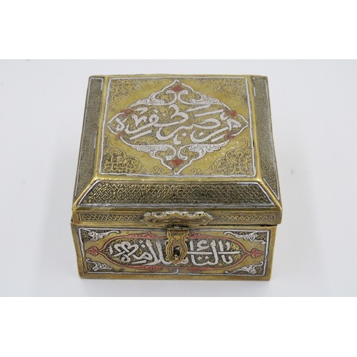 19 - An Islamic Egyptian Brass Box with Silver Inlay and Wooden Inside

Height: Approximately 8.2cm
Lengt... 