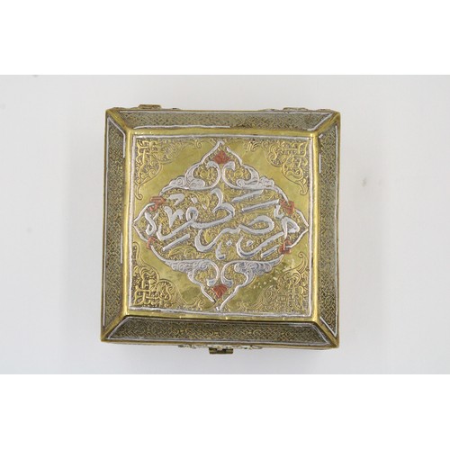 19 - An Islamic Egyptian Brass Box with Silver Inlay and Wooden Inside

Height: Approximately 8.2cm
Lengt... 