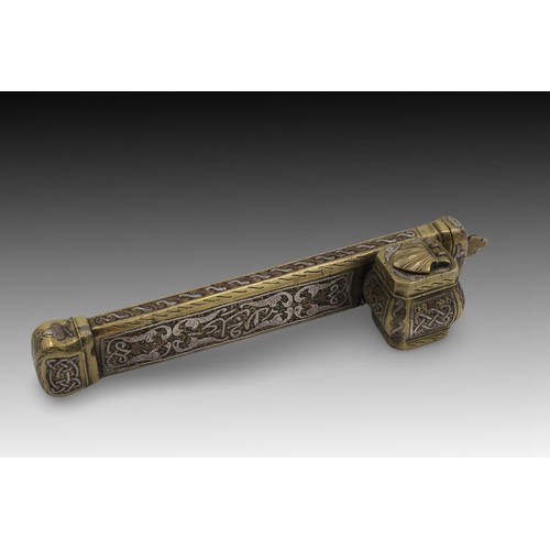 20 - An Islamic Egyptian Silver Inlaid Inkwell Qalamdan

Length: Approximately 23cm