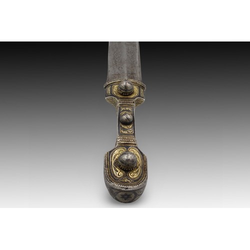 23 - A Caucasian Sword with an Engraved Silver Handle and Niello Decorations from the 19th Century. 

Len... 