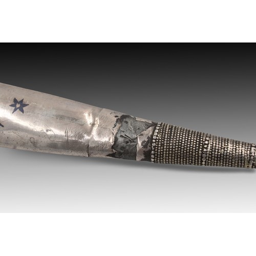 23 - A Caucasian Sword with an Engraved Silver Handle and Niello Decorations from the 19th Century. 

Len... 