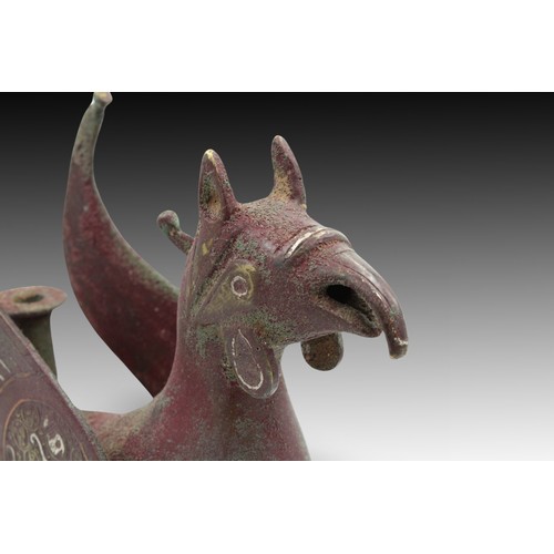 24 - An Islamic Bronze Animal-like Figure Oil Lamp from the 20th Century with Silver Inlay & Islamic Call... 