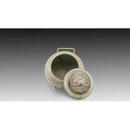 37 - An Islamic Bronze Sugar Pot from Possibly the 19th Century

Height: Approximately 11.5cm
Diameter fr... 