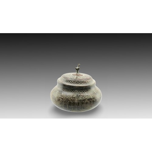 37 - An Islamic Bronze Sugar Pot from Possibly the 19th Century

Height: Approximately 11.5cm
Diameter fr... 