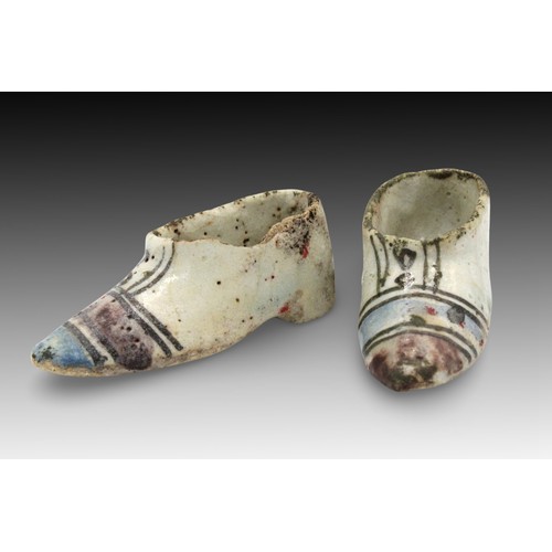 41 - An Islamic Pair of Boots from the 19th Century from the Kütahya Province, made from Pottery 

Height... 