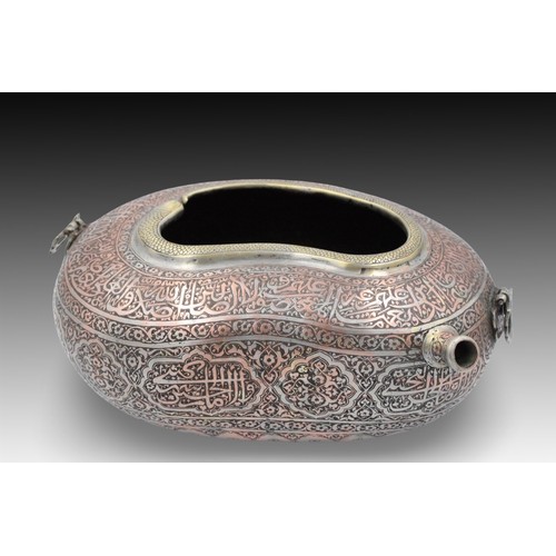 61 - An Islamic Copper Kashkul (Begging Bowl) with Islamic Calligraphy Snake Design on the Tip

Height: A... 