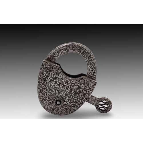 66 - An Islamic Iron Lock with Key with Islamic Calligraphy Carving

Height: Approximately 13.3cm
Length:... 