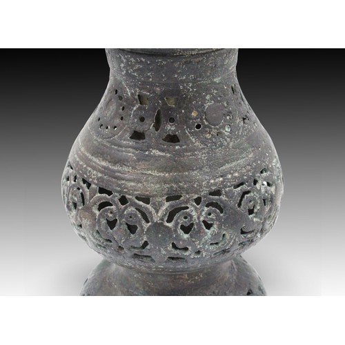 74 - An Islamic Ghaznavid Bronze Vase from the 13th Century AD with Beautiful Open Work

Height: Approxim... 