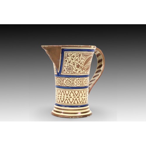 86 - An Islamic Moresque Jug from the 19th Century decorated with Bands of Foliate and Geometric Motifs

... 