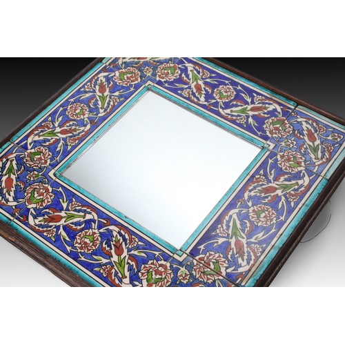 89 - An Ottoman Floral Mirror from the 20th Century Set within a Wooden Frame

Height: Approximately 43.5... 