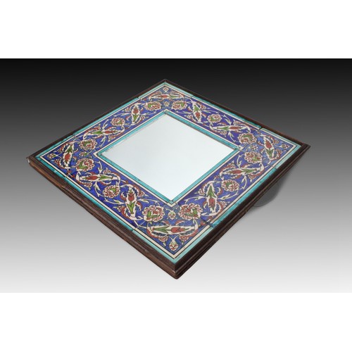 89 - An Ottoman Floral Mirror from the 20th Century Set within a Wooden Frame

Height: Approximately 43.5... 