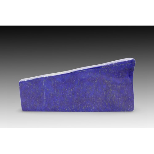 113 - An Afghan Polished Lapis Lazuli Decorative Piece from the 20th Century.

Length: Approximately 24cm
... 