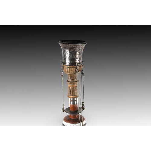 123 - A Persian Hookah from the 19th Century; with a Silver Base, Top Carved of Steel

Height: Approximate... 