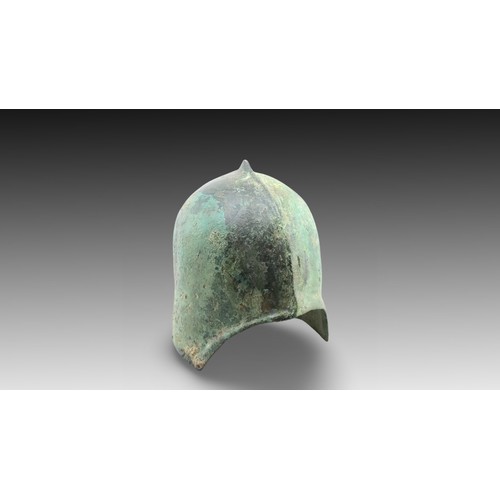 142 - An Ancient Roman Helmet with Lovely Patina

Height: Approximately 23cm