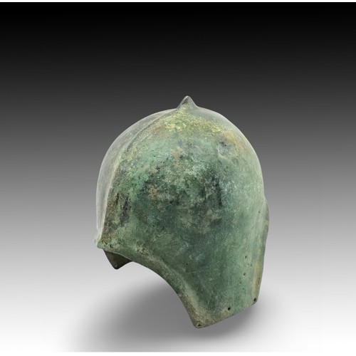 142 - An Ancient Roman Helmet with Lovely Patina

Height: Approximately 23cm