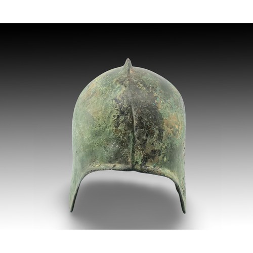 142 - An Ancient Roman Helmet with Lovely Patina

Height: Approximately 23cm