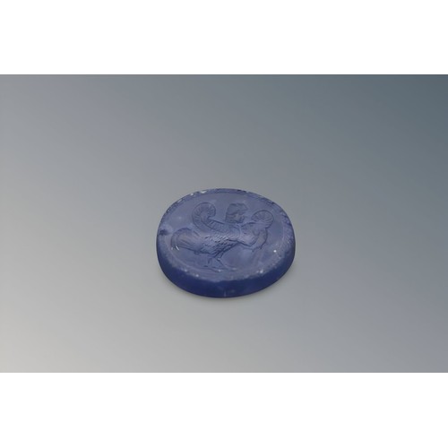 171 - An Eastern Greek Blue Chalcedony Scaraboid from the 3rd Century or Earlier. Engraved with Siren in P... 