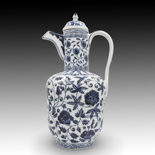 193 - A Chinese Blue & White Watering Pot with Elegant Floral Design.

Height: Approximately 40cm 
Diamete... 