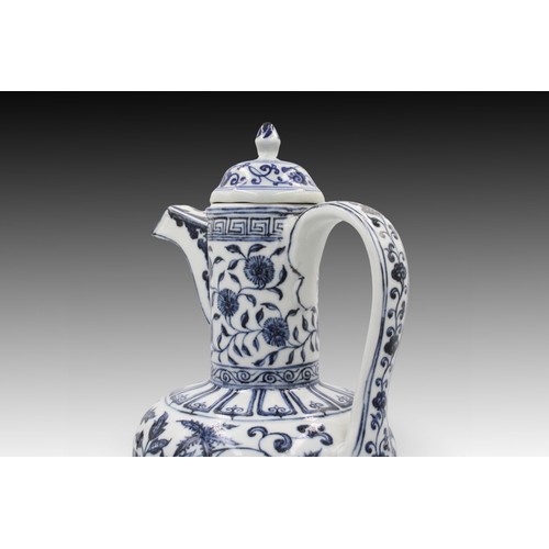 193 - A Chinese Blue & White Watering Pot with Elegant Floral Design.

Height: Approximately 40cm 
Diamete... 