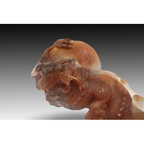 239 - A Chinese Agate Magnificently Carved of a Dragon

Height: Approximately 12.9cm
Length: Approximately... 