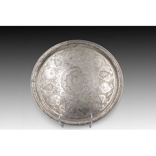 394 - A Persian Silver Tray with Beautiful Carving

Diameter: Approximately 28cm

Weight: 535g