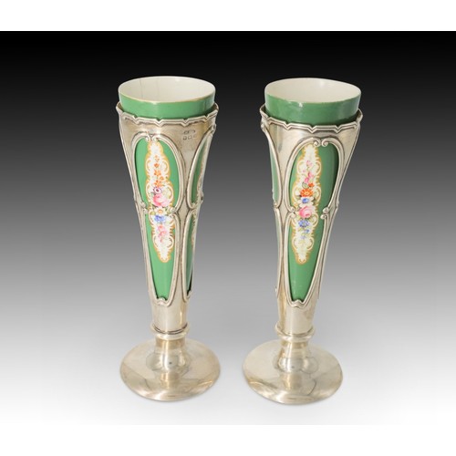 396 - A Pair of English Birmingham Silver Vases marked in 1907 With a Porcelain Cup Inside

Height: Approx... 