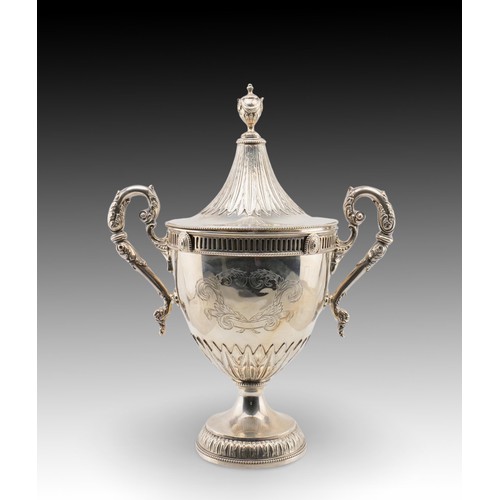 398 - A Silver London Trophy marked in 1923

Weight: 1434g
Height: Approximately 33cm
Length: Approximatel... 