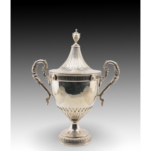 398 - A Silver London Trophy marked in 1923

Weight: 1434g
Height: Approximately 33cm
Length: Approximatel... 