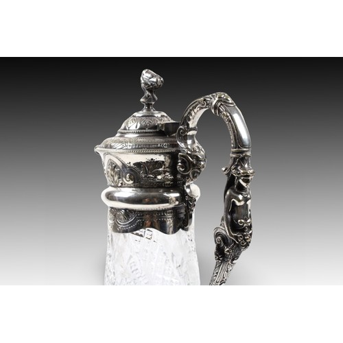 405 - A Silver Plated Claret Jug

Weight: 1585g
Height: Approximately 29.5cm