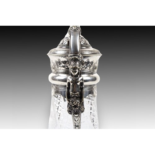 405 - A Silver Plated Claret Jug

Weight: 1585g
Height: Approximately 29.5cm