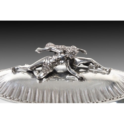 409 - A Continental Silver Soup Tureen 

Weight: 2490g
Length: Approximately 44cm
Width: Approximately 24.... 