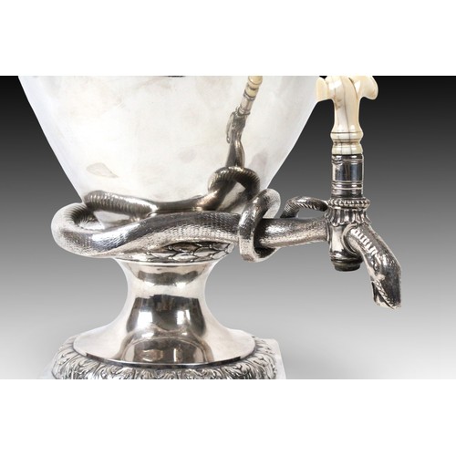 414 - A London Silver Samovar marked in 1854

Weight: 3845g
Height: Approximately 58cm
Width: Approximatel... 