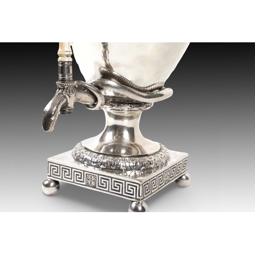 414 - A London Silver Samovar marked in 1854

Weight: 3845g
Height: Approximately 58cm
Width: Approximatel... 