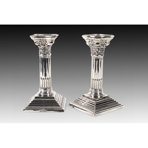 416 - A Pair of 2 Birmingham Silver Candlesticks marked in 1963

Weight: 1025g
Height: Approximately 16.6c... 