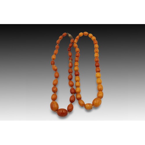 429 - 2 Butterscotch Amber Bead Necklaces.

Length: Approximately 43.5cm and 45.5cm(with Metal Clasp.

Wei... 