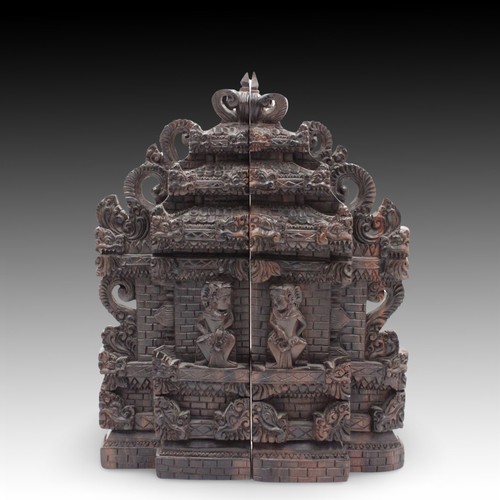 434 - An Indonesian Handcrafted Hardwood Bookends.

Height: Approximately 30cm
Length: Approximately 23.5c... 