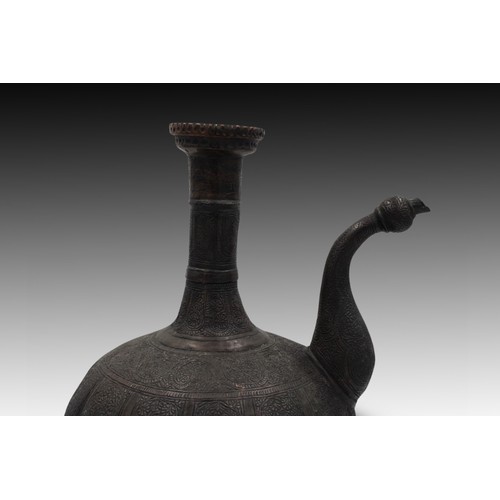 13 - An Islamic Water Jug with an Exquisite Patterned Design.

Height: Approximately 30 cm.