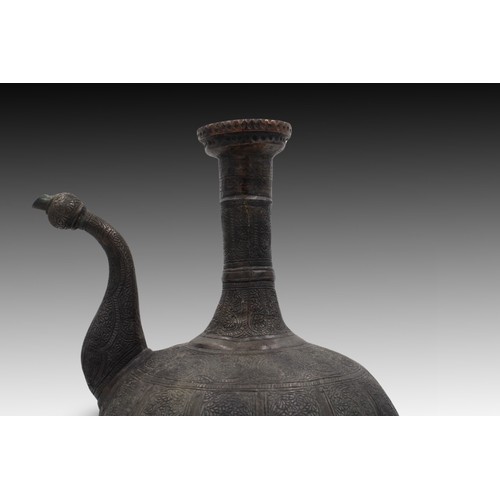 13 - An Islamic Water Jug with an Exquisite Patterned Design.

Height: Approximately 30 cm.