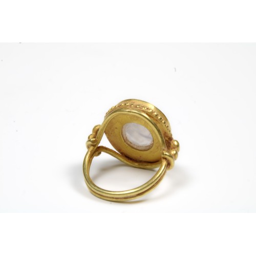 445 - A Gold Ring with White Chalcedony Agate Intaglio of the Head of a Roman Deity

Ring Size: US7.25 UK1... 