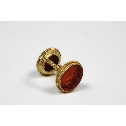 447 - A Gold Double Headed Intaglio Ring Representing Tyne in Red Carnelian on One Head and a Cameo Intagl... 