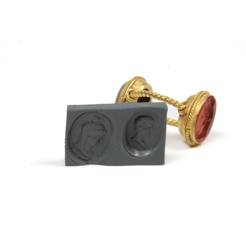 447 - A Gold Double Headed Intaglio Ring Representing Tyne in Red Carnelian on One Head and a Cameo Intagl... 