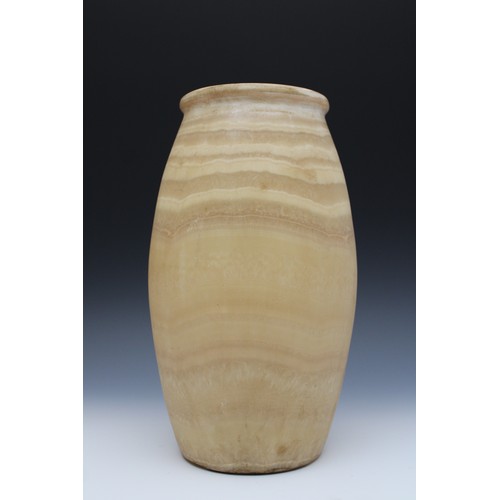 405 - An Egyptian Alabaster Vase. 

H: Approximately 34cm
Top D: Approximately 14.5cm