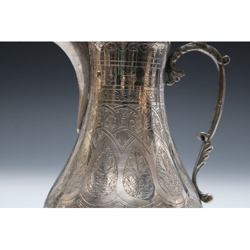 9 - An Islamic Silver Coffee Pot Decorated with Islamic Calligraphy with Rose and Bird Finial.

H: Appro... 