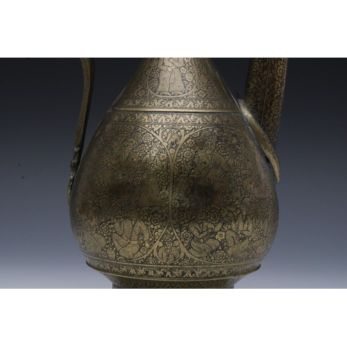 12 - A Rare Persian Brass Aftaba Ewer from the 19th Century Decorated with People and Floral Designs.

H:... 