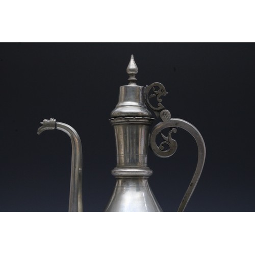 4 - An Islamic Ottoman Copper Silver Polished Ewer Aftaba from the 19th Century.

H: Approximately 40cm