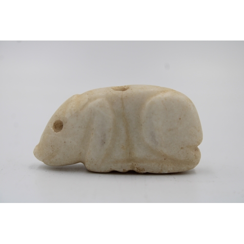 410 - A Jemdet Nasr Crème Alabaster Amulet of a Seated Pig from 2000- 3000 B.C.

L: Approximately 5cm