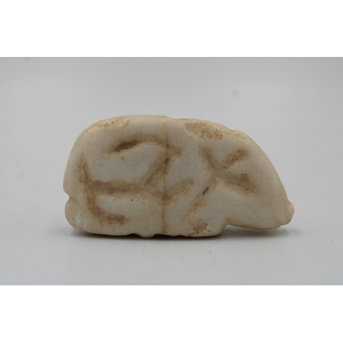 410 - A Jemdet Nasr Crème Alabaster Amulet of a Seated Pig from 2000- 3000 B.C.

L: Approximately 5cm