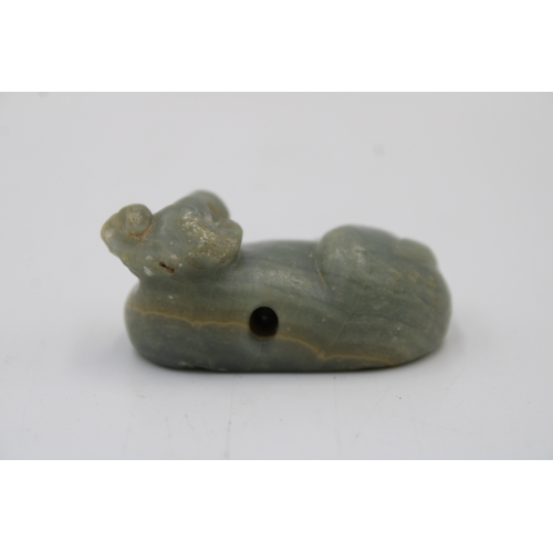 411 - A Rare Green Marble Jemdet Nasr Amulet of a Seated Bull from 2000- 3000 B. C. 

L: Approximately 5cm