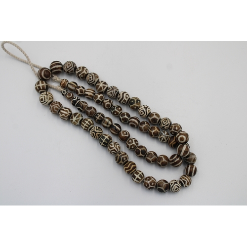 178 - A Tibetan Pumtek Petrified Wood Stone Dzi Beads Long Necklace.

L: Approximately 96cm
Each Bead: App... 